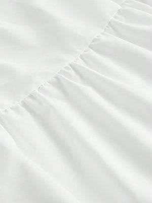 Vestido Blanco Largo A Capas Con Espalda Al Aire detalle falda en capas.