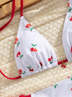 Bikini Blanco Estampado De Cerezas Con Lazo Y Copa Triangular detalle estampado.