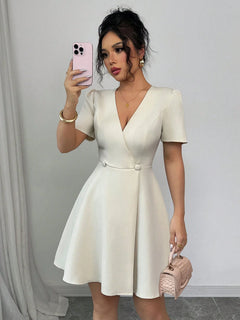 Vestido mini albaricoque con manga farol vista frontal