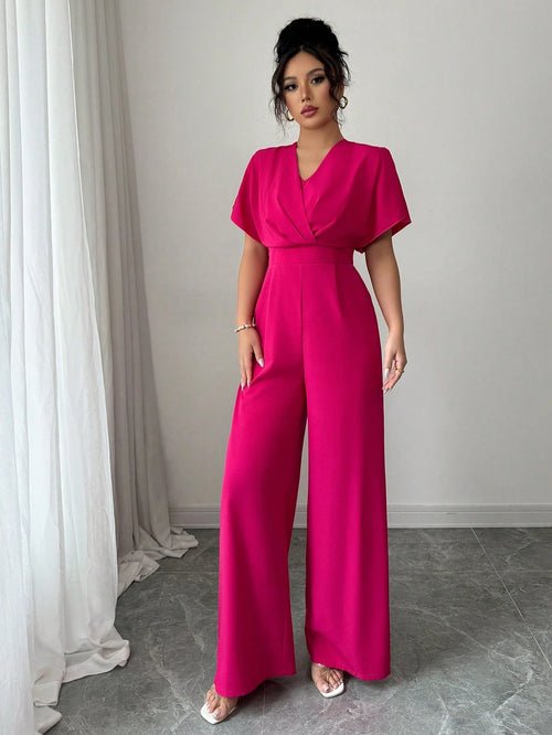 Jumpsuit rosa fucsia elegante para mujer.