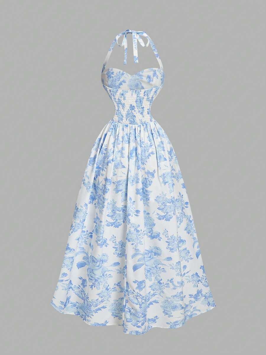 Vestido midi floral azul y blanco estilo halter con falda acampanada