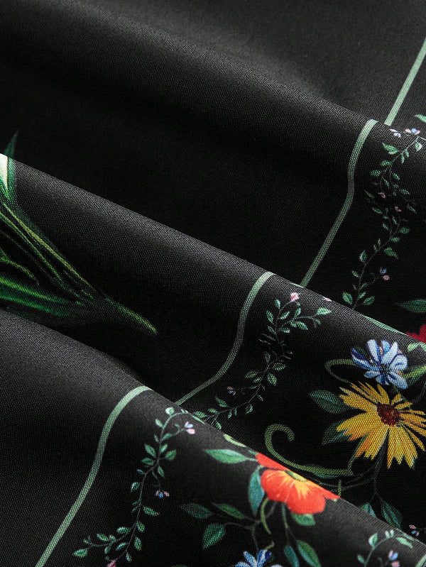 Vestido Corto Negro Bordado Floral Con Tirantes De Lazo detalle de la tela y estampado.