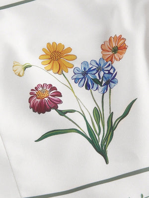Vestido Corto Blanco Floral Bordado Con Tirantes De Lazo vista trasera del diseño.
