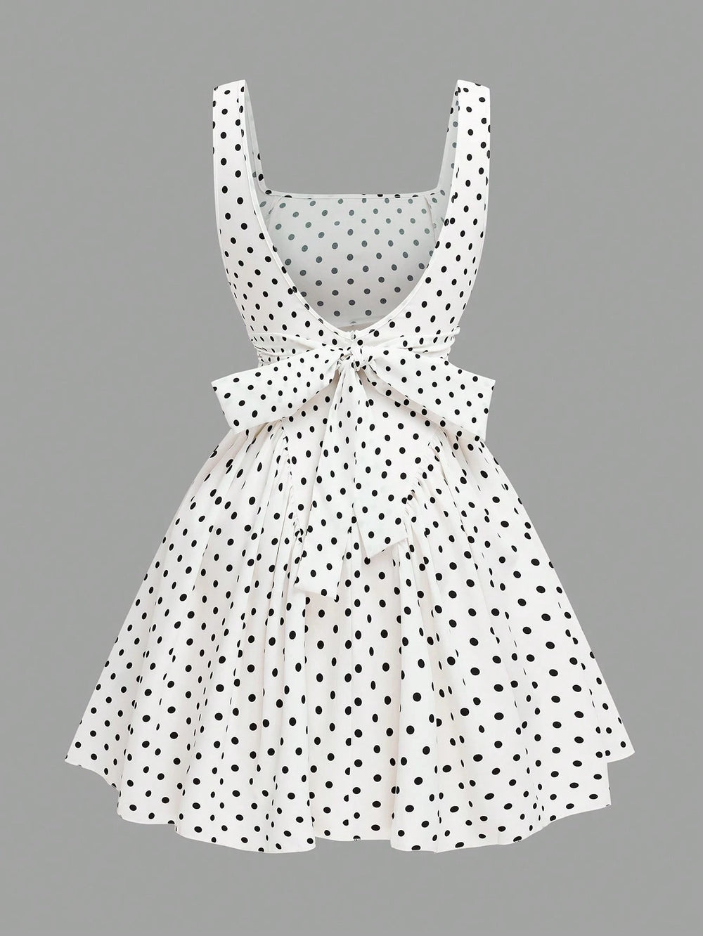 Vista frontal del Pichi Mini De Lunares sobre un fondo neutro.