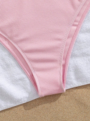 Traje De Baño Rosa Textura detalle de tela texturizada en color rosa.