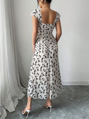 Vestido largo estampado con escote cuadrado vista trasera.