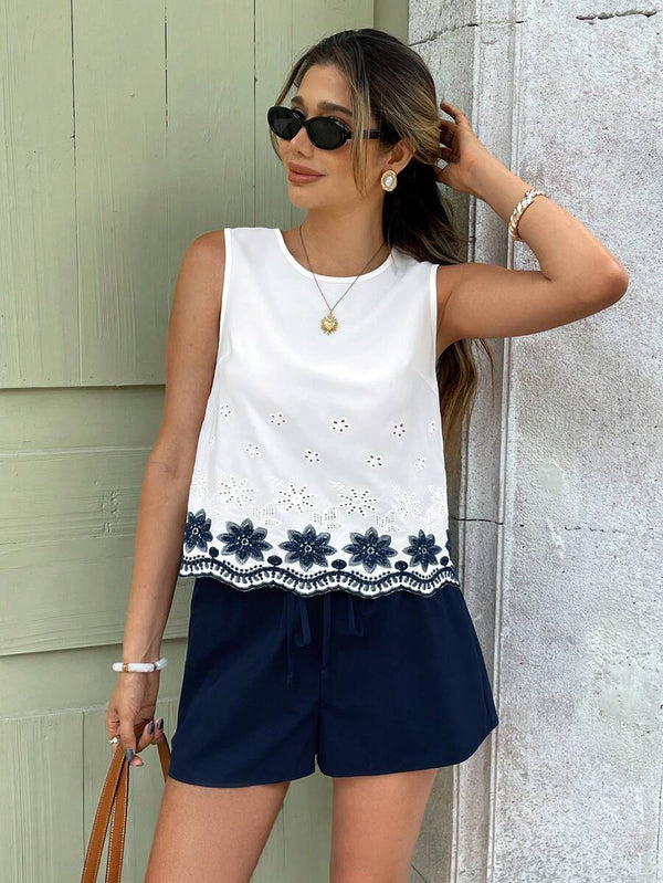 Blusa Blanca Sin Mangas Con Bordado Floral Azul