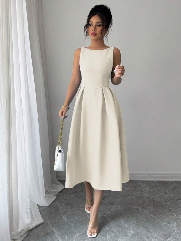 Vestido elegante albaricoque con falda campana para eventos formales.
