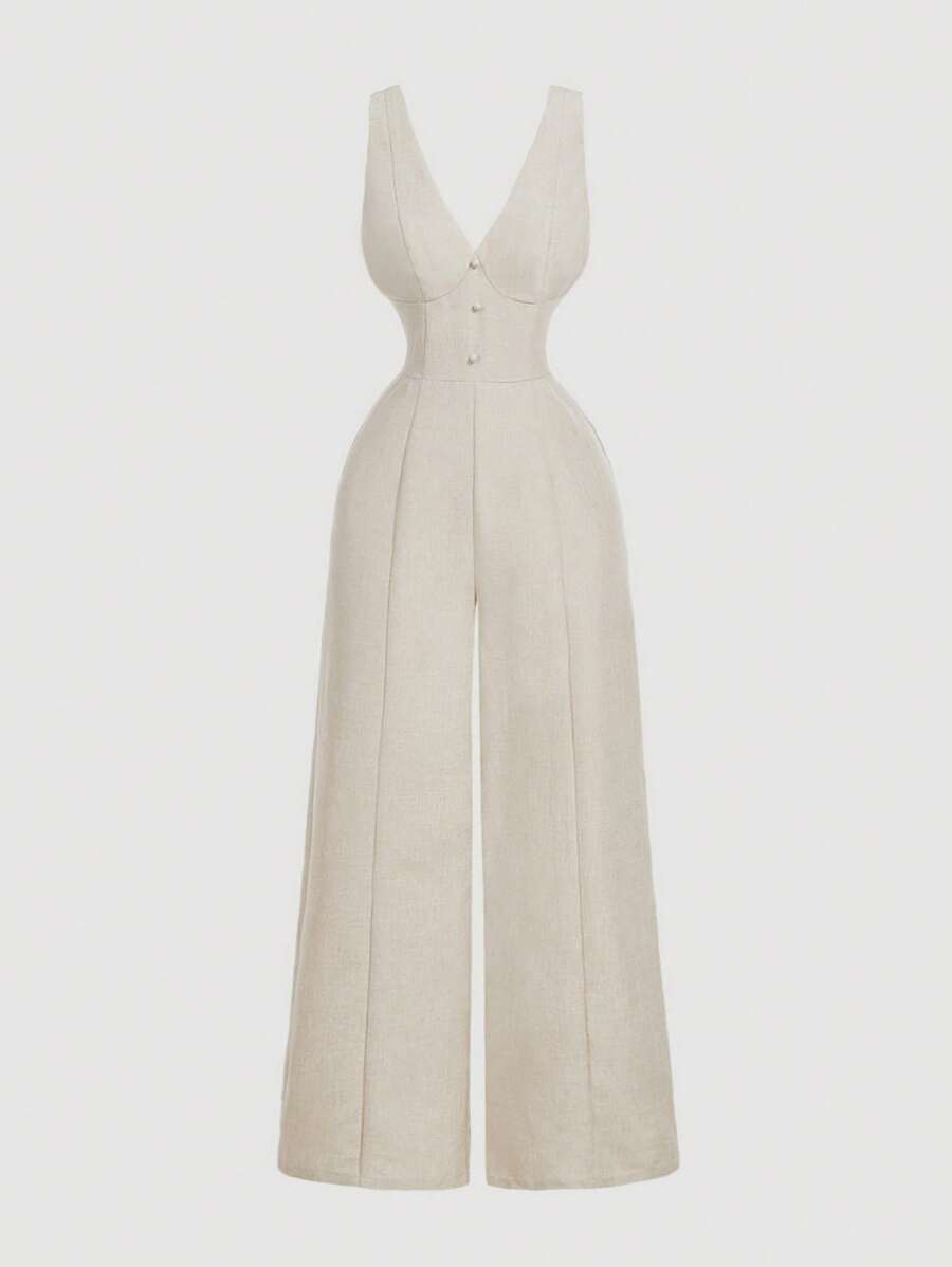 Jumpsuit elegante color beige de pierna ancha visto de frente.