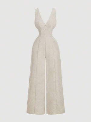 Jumpsuit elegante color beige de pierna ancha visto de frente.