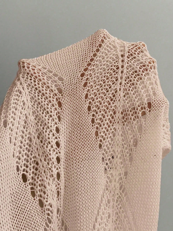 Abertura lateral del vestido crochet albaricoque semitransparente