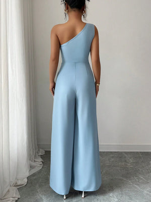 Enterizo azul asimétrico elegante con lazo y pierna ancha vista posterior