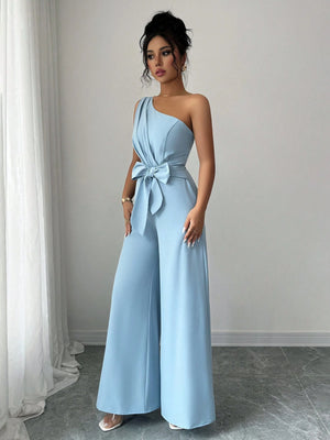 Enterizo azul asimétrico elegante con lazo y pierna ancha detalle cintura