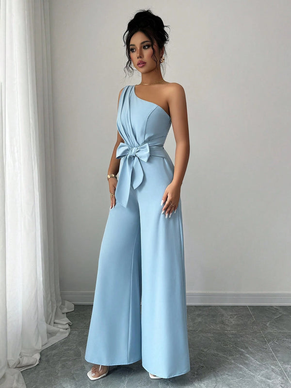 Enterizo azul asimétrico elegante con lazo y pierna ancha detalle cintura