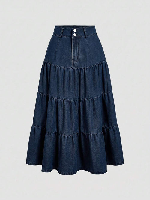 Falda larga de mezclilla azul oscuro con diseño a capas y doble botón en la cintura