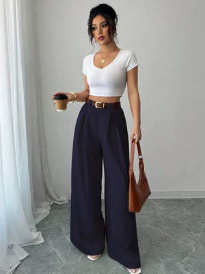 Pantalón azul marino elegante de pierna ancha con bolsillos