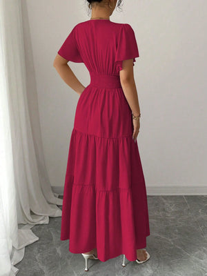 Vestido burdeos elegante con talle alto y vuelo – vista trasera