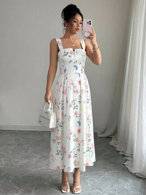 Modelo con vestido bohemio midi floral y bolso blanco