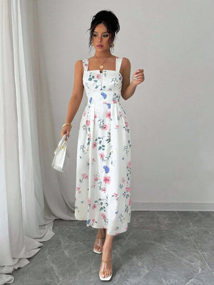 Vestido midi bohemio floral multicolor en pose elegante