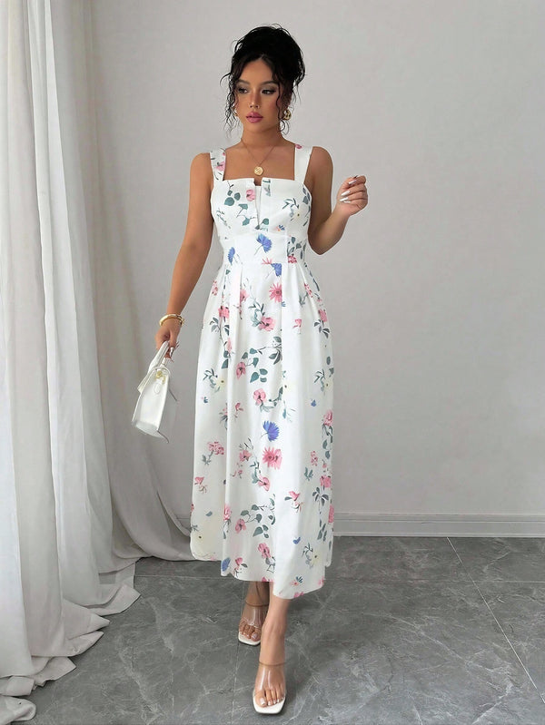 Vestido midi bohemio floral multicolor en pose elegante