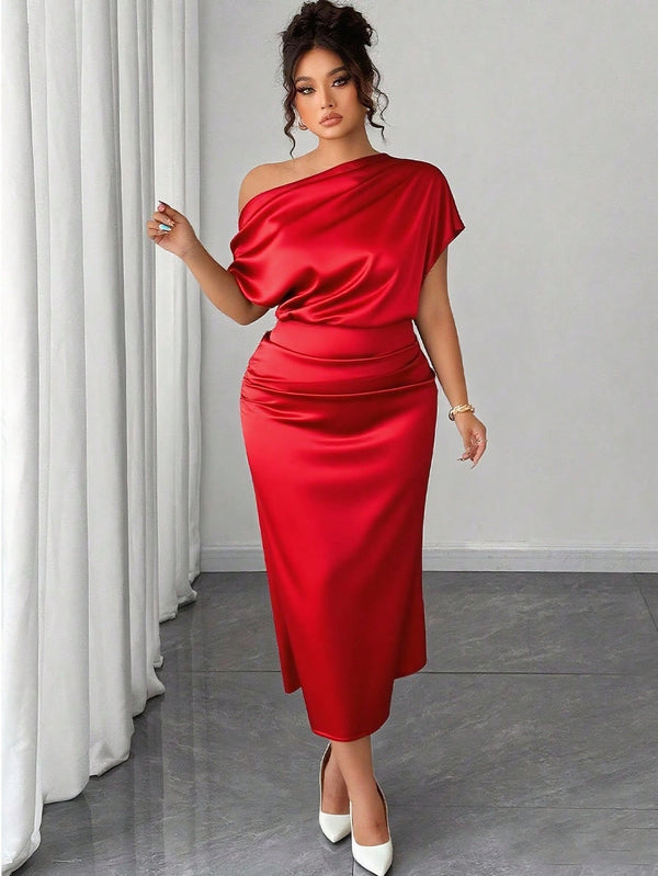 Vestido rojo asimétrico midi elegante con manga murciélago