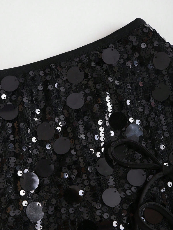 Falda elegante con lentejuelas textura y short interno.