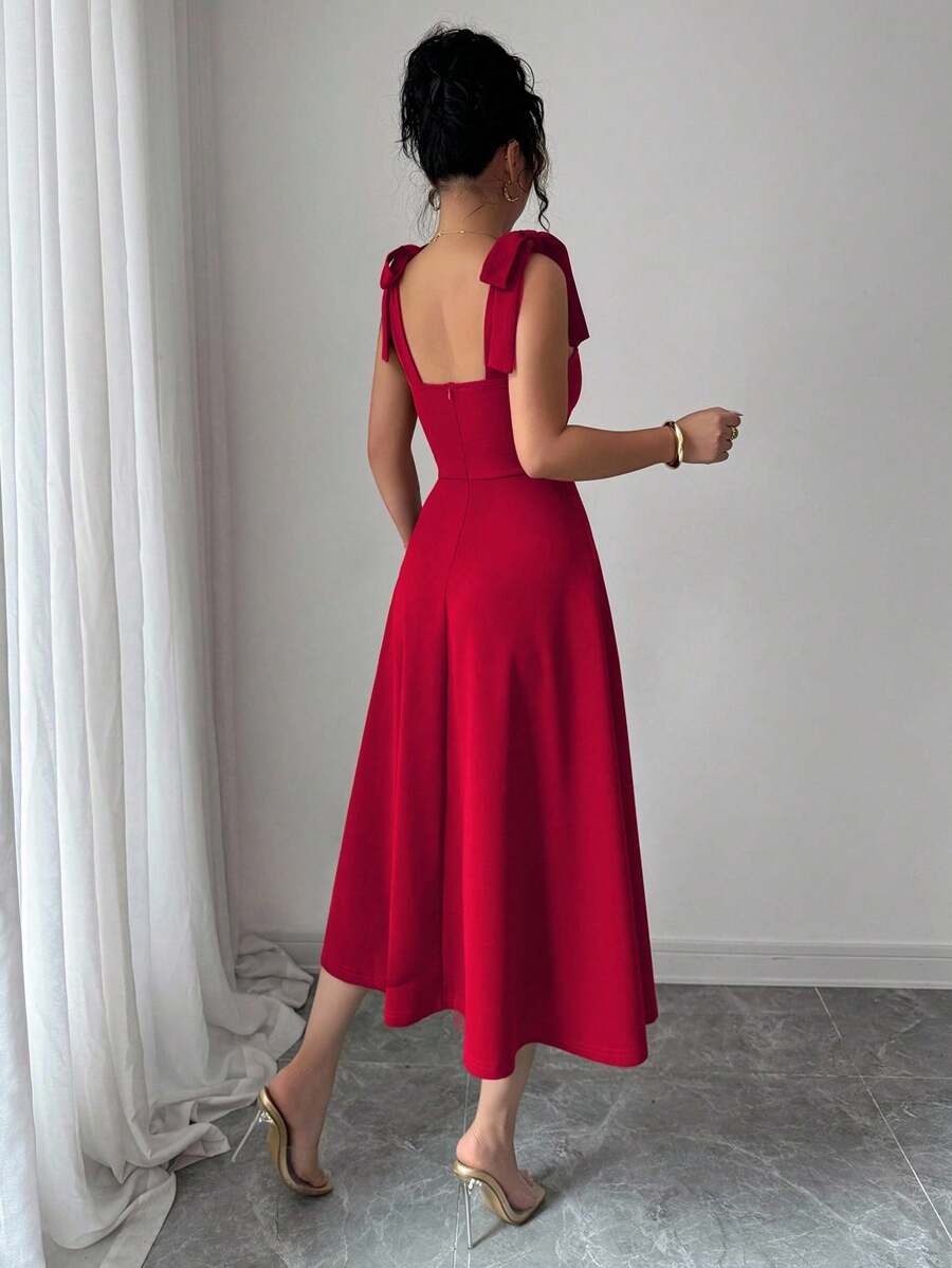 Vestido elegante rojo con tirantes y manga farol vista frontal