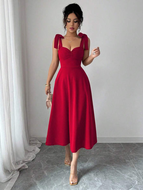 Vestido elegante rojo con tirantes y manga farol vista frontal