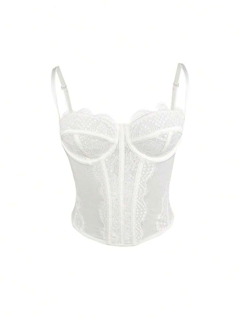 Vista frontal de top corset de encaje blanco con tirantes ajustables.