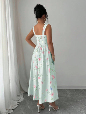 Vestido verde midi con tirantes y estampado floral vista trasera.