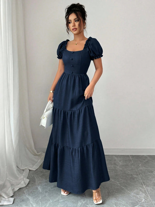 Vestido azul marino largo con manga farol look completo.
