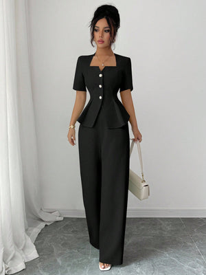 Conjunto elegante negro para oficina en vista frontal.