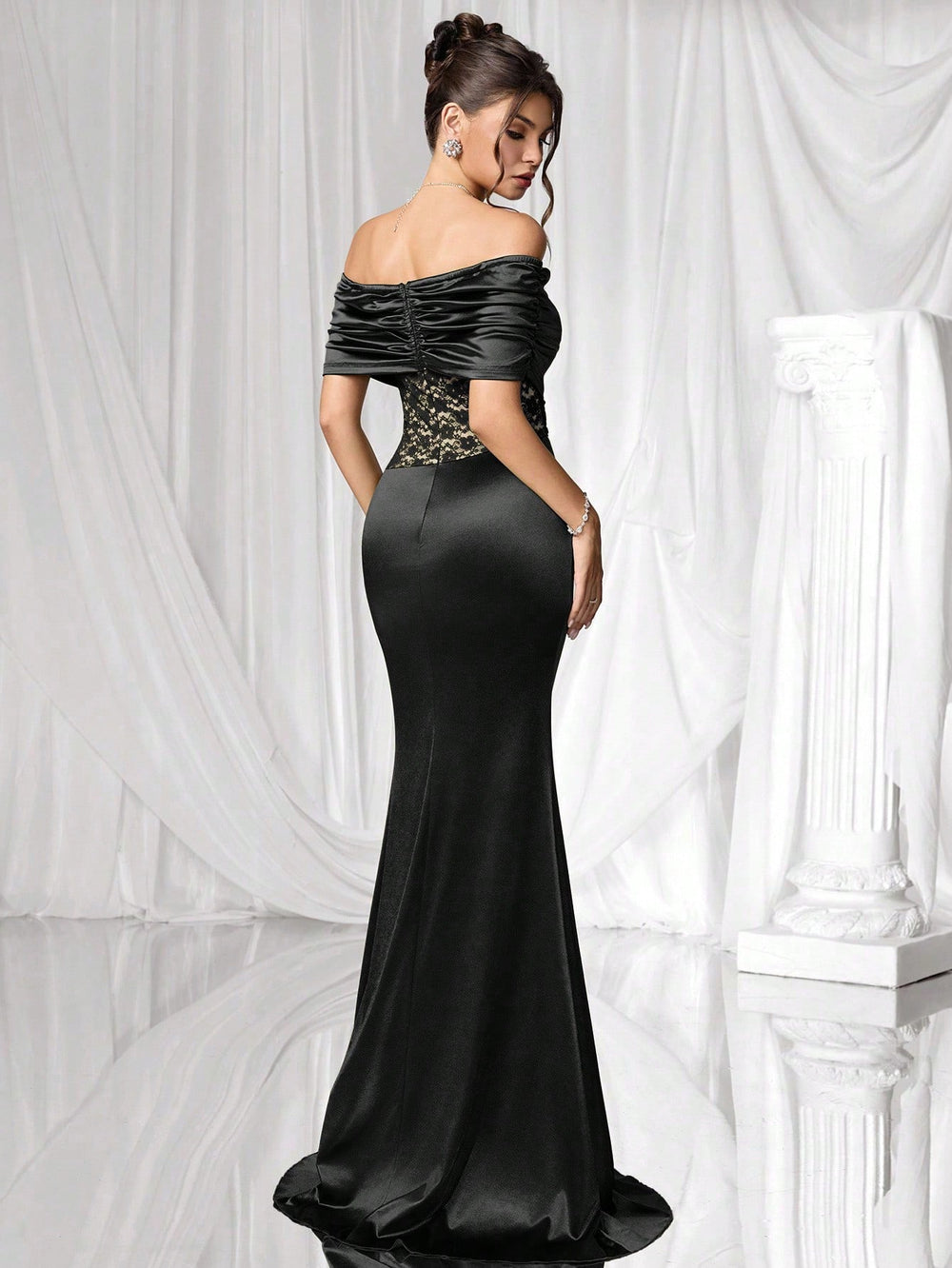 Vestido negro elegante sirena para fiesta en vista frontal.