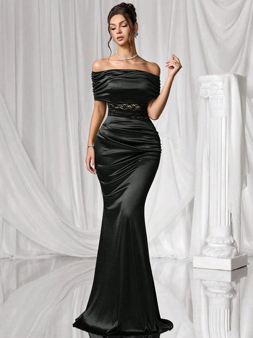 Vestido negro elegante sirena para fiesta en vista frontal.