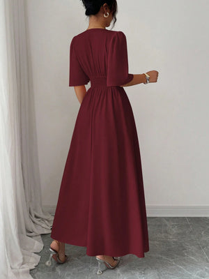 Vestido Burdeos Largo A Línea Con Manga Farol vista posterior.
