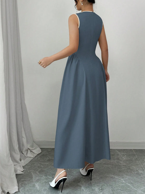 Vestido Azul Lavado Medio Midi Elegante Cruzado vista posterior.
