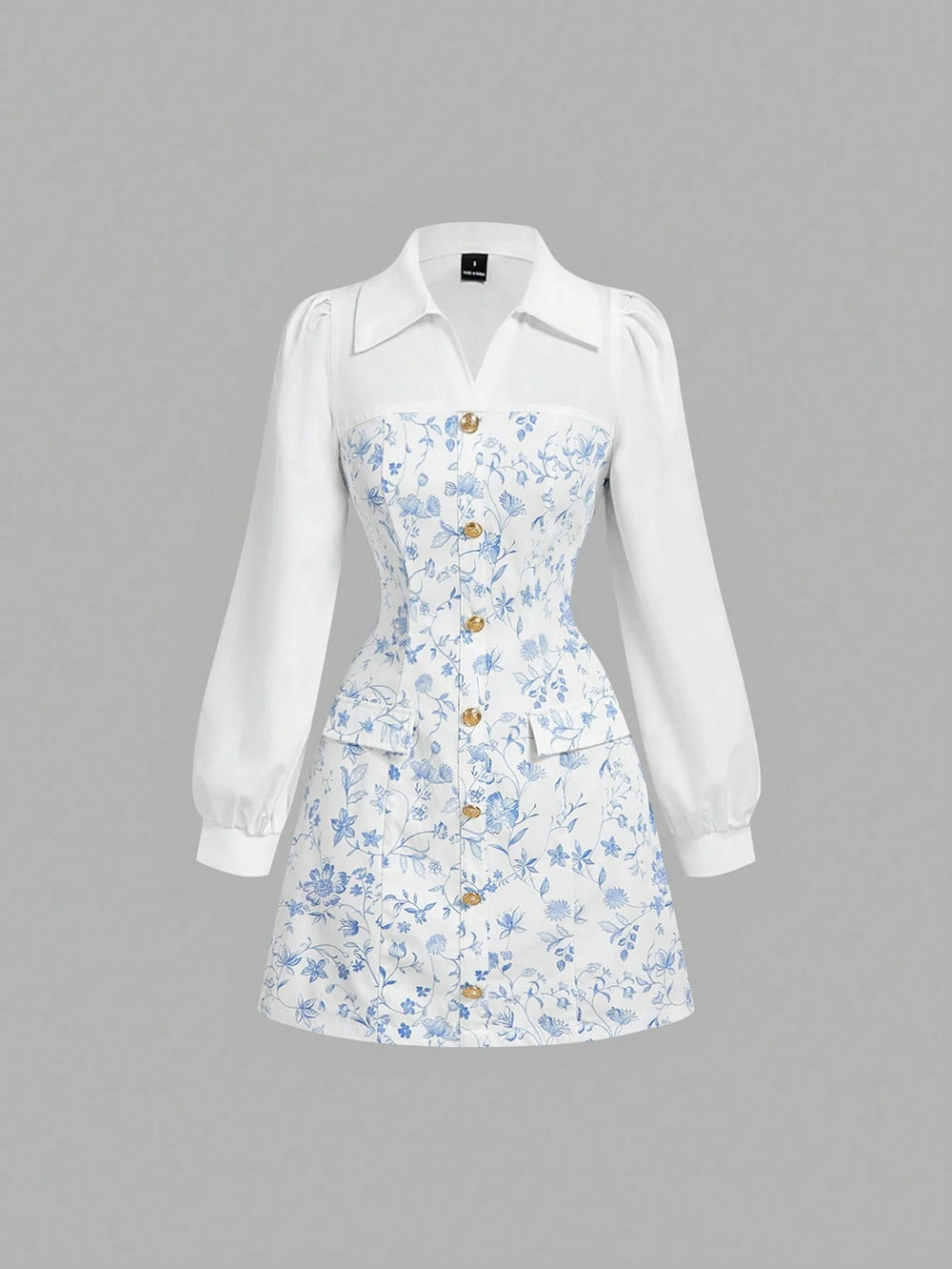 Vestido Mini Azul Y Blanco Estampado Floral Camisero A Línea vista frontal.
