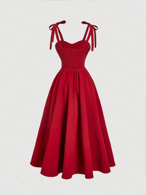 Vestido midi rojo con tirantes y espalda descubierta vista posterior
