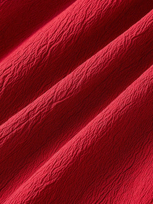 Vestido midi rojo con tirantes y espalda descubierta textura de tela