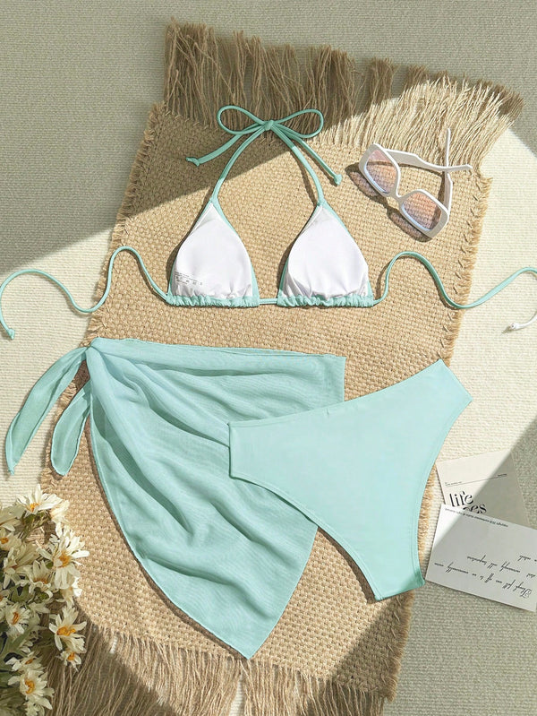 Pareo transparente del bikini celeste de tres piezas