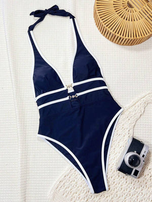 Traje de baño enterizo estilo náutico azul marino con bordes en contraste blanco