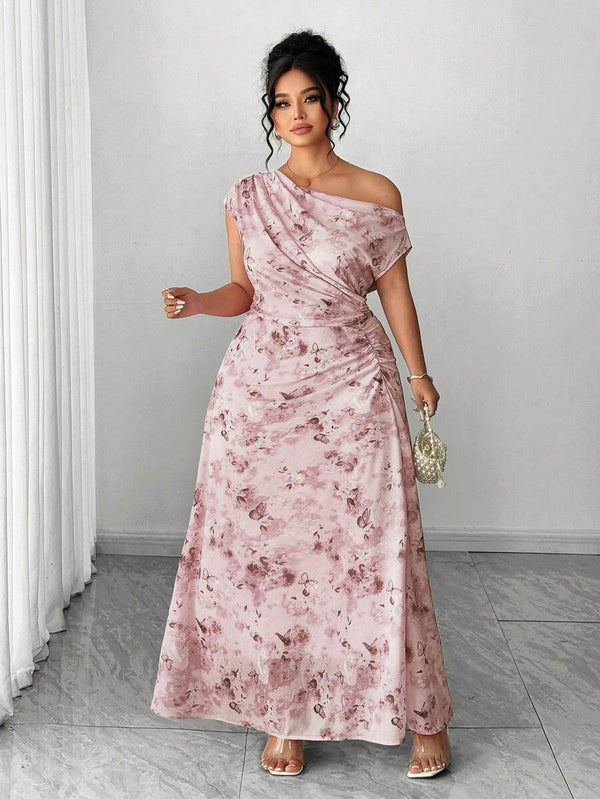 Vista completa del vestido largo rosa con falda fluida, ideal para ocasiones especiales.