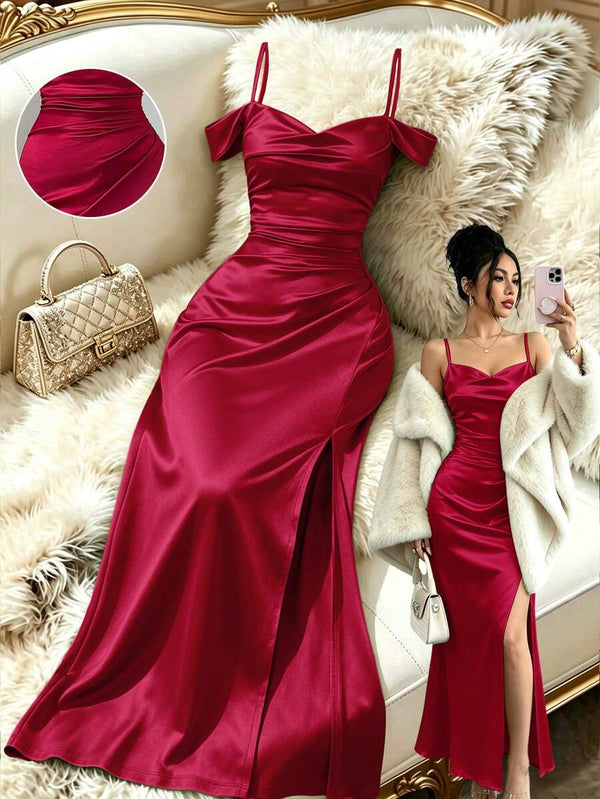 Vista inferior de la falda larga tipo sirena de un vestido de fiesta color vino.