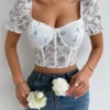 Top corto panel floral de manga farol bustier