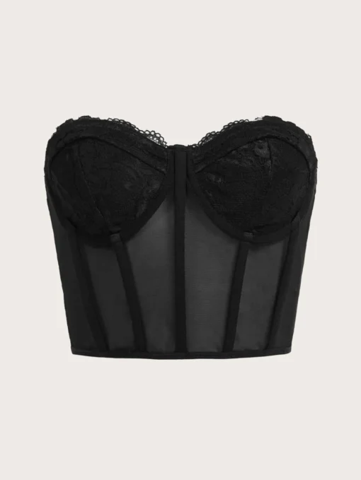 Vista frontal del top corsé negro con encaje en contraste y diseño transparente.