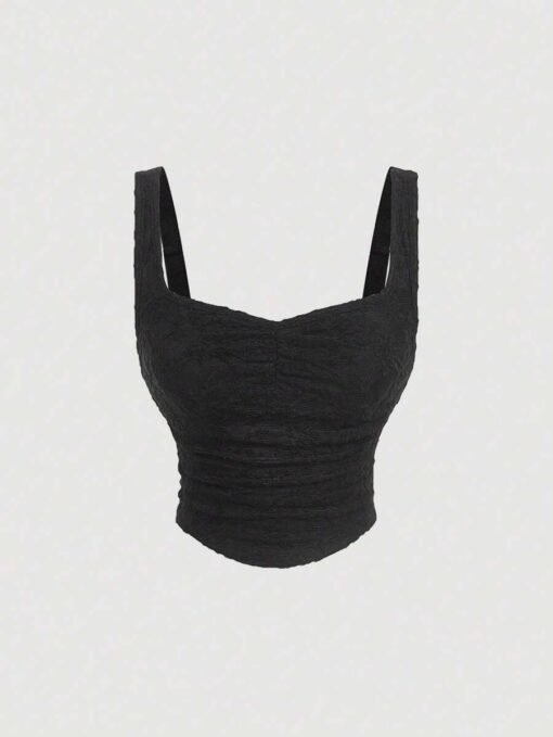Top del set elegante negro con tirantes y frunces