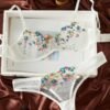 Set de lencería multicolor con bordado floral y sujetador transparente