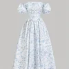 Vestido floral bohemio azul con hombros descubiertos y manga farol