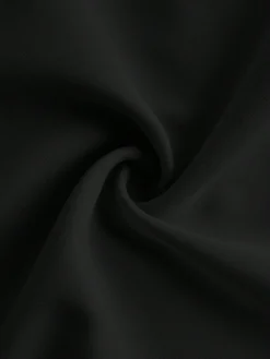Textura del tejido del mono elegante negro – mono elegante negro