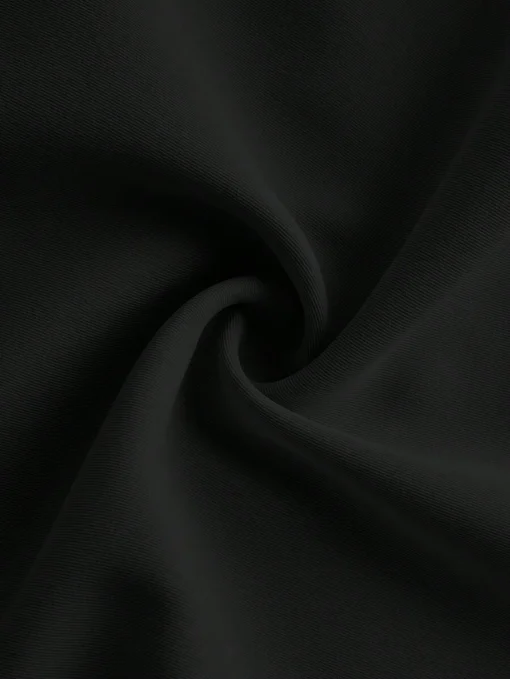 Textura del tejido del mono elegante negro – mono elegante negro